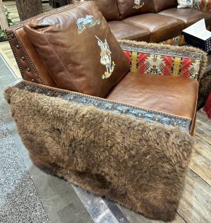 The Cody Swivel Glider Chair With Embroidery and Bison